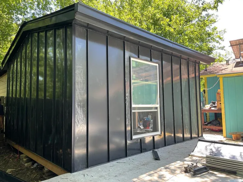 Black standing seam metal wall panels for Metal Roof Installation in Baldwinsville