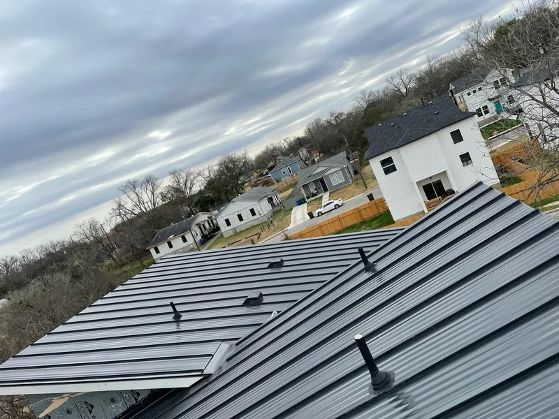 Standing seam metal roof panels with vents for Skylight Repair in Baldwinsville